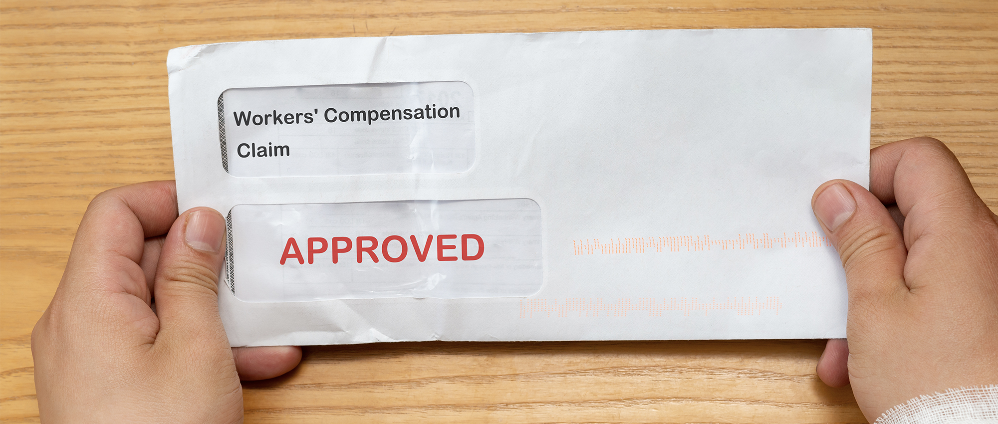 Worker hold letter with approved Workers Comp claim.