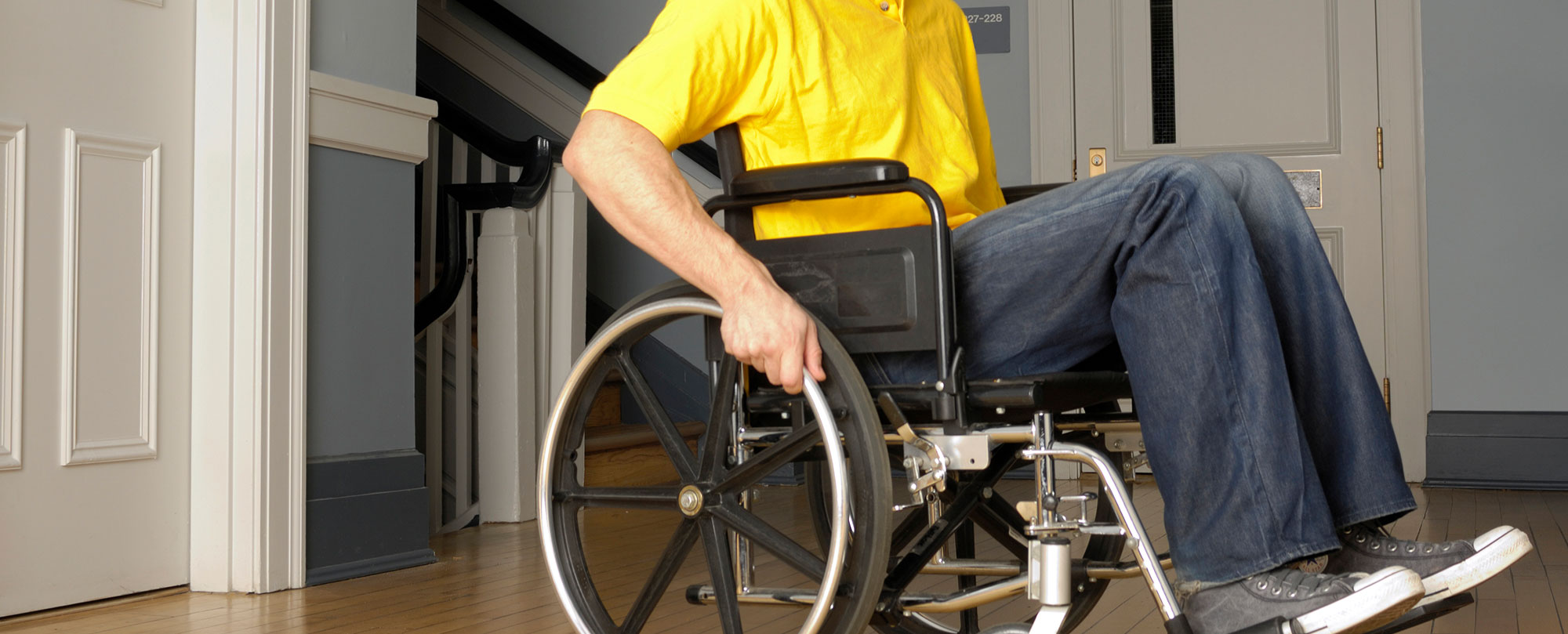 image of man in wheelchair due to a work related injury