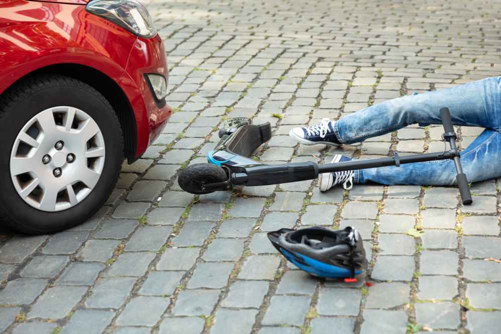 Man Run Over by Car After Electric Scooter Accident