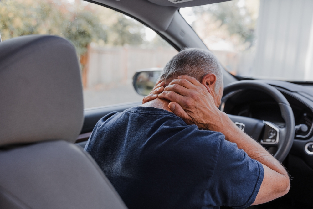 Man with a neck injury as a result of a car accident