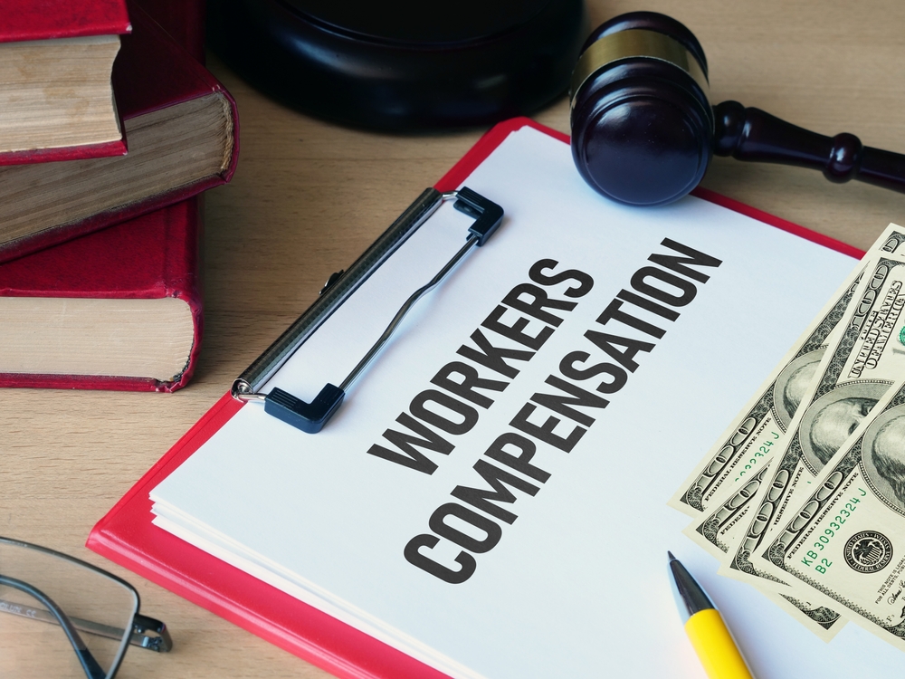 Workers' compensation details are displayed using text.