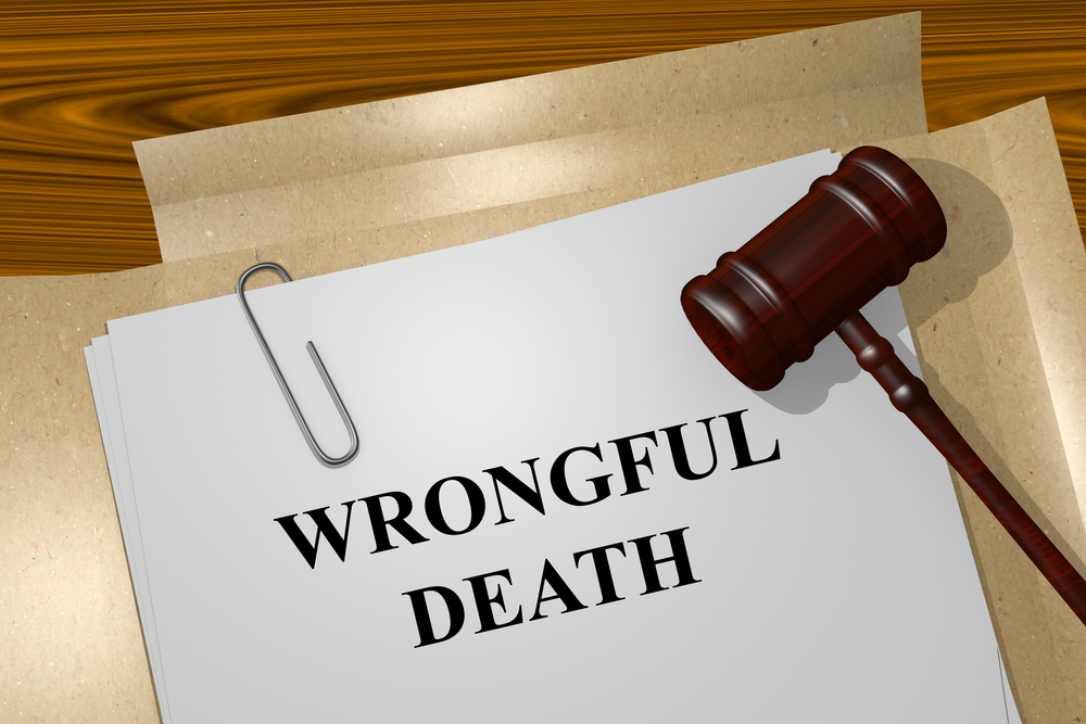 Render illustration of "Wrongful Death Claim" title on legal documents.