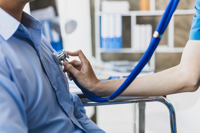 A person being examined by a doctor.