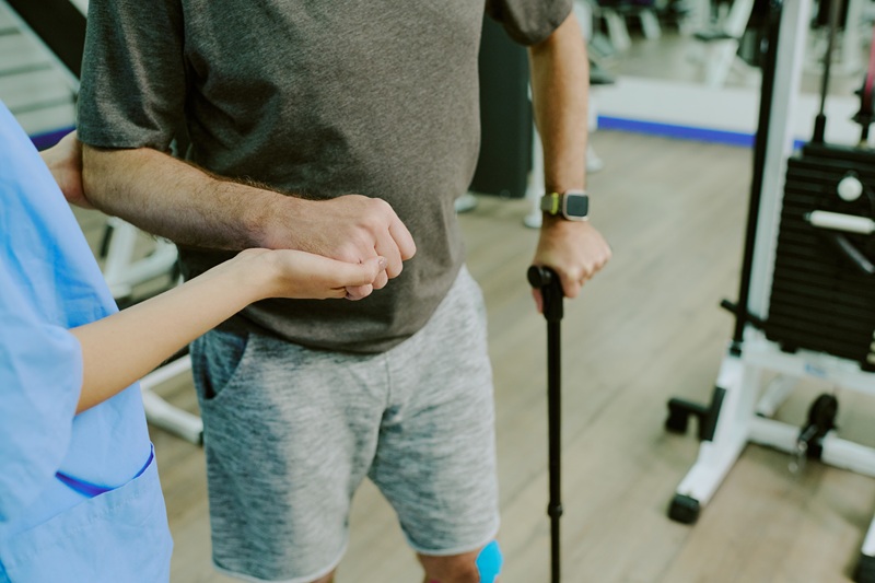 A patient going through rehab after a car accident injury