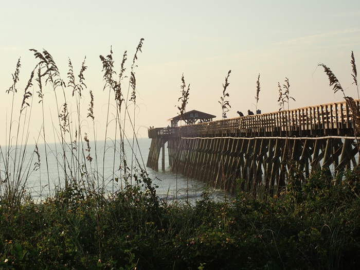 A pier where people can walk out and enjoy the ocean