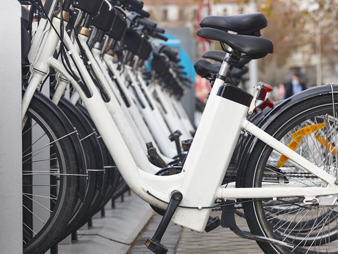 Urban electric bikes charging batteries in the city.